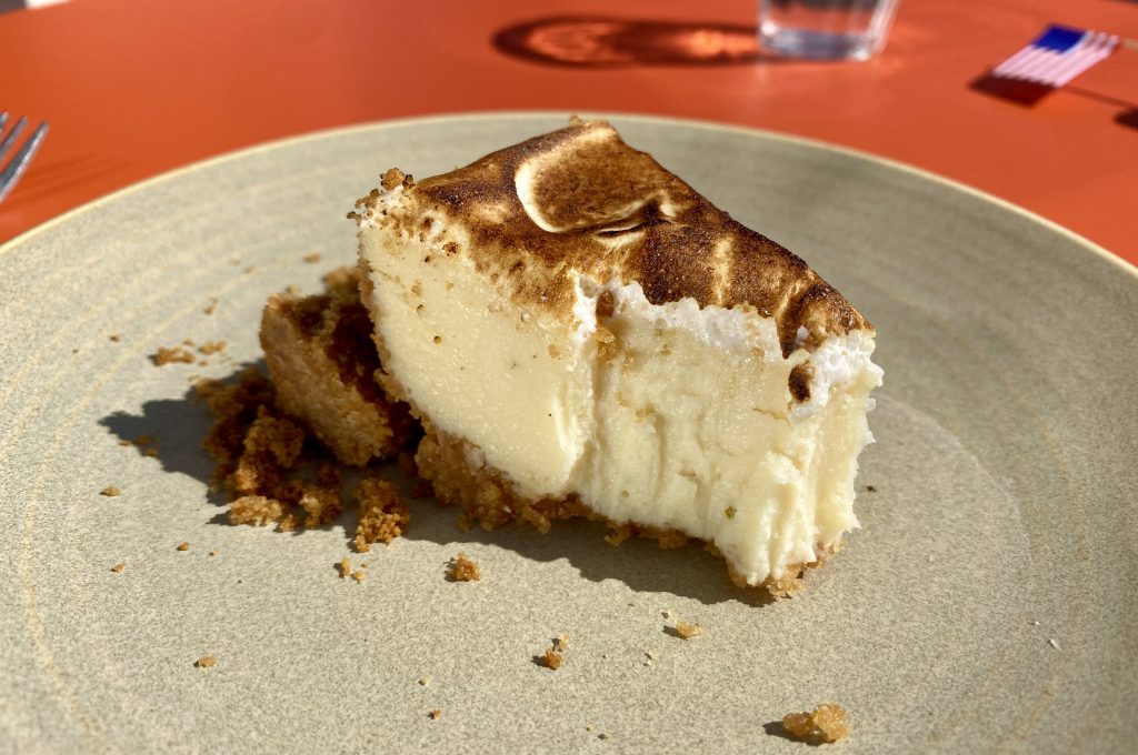 Close-up of a key lime pie's cross-section.